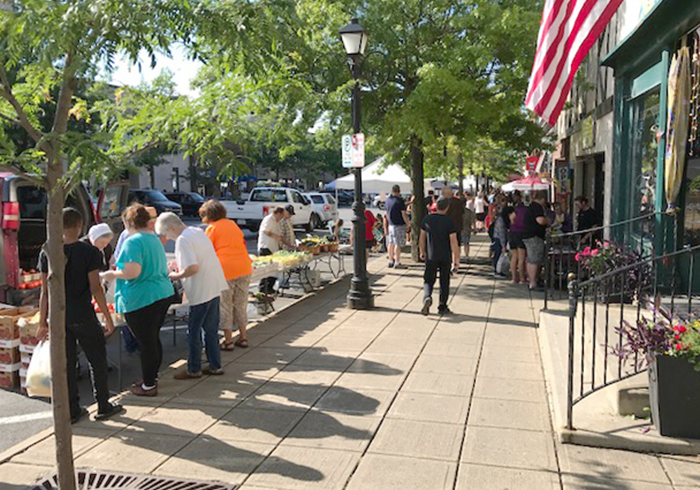 Farmers Market in downtown Oswego. Get fresh produce — and a feel for the city.