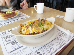 One of the featured selections on the breakfast menu at Jocko’s Famous Ritz Diner is the breakfast boat. The Ritz original comes complete with hash browns topped with scrambled eggs, sausage, bacon, peppers, onions and Monterey Jack shredded cheese.