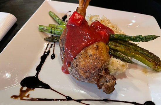 The sous vide duck leg at Red Sun Fire Roasting Co had a crispy, delicious skin braised with orange pekoe tea. It was also covered with a raspberry and Riesling coulis.