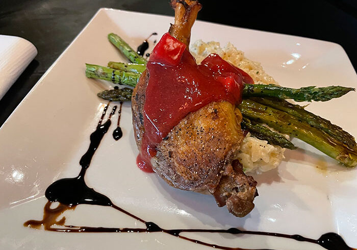 The sous vide duck leg at Red Sun Fire Roasting Co had a crispy, delicious skin braised with orange pekoe tea. It was also covered with a raspberry and Riesling coulis.